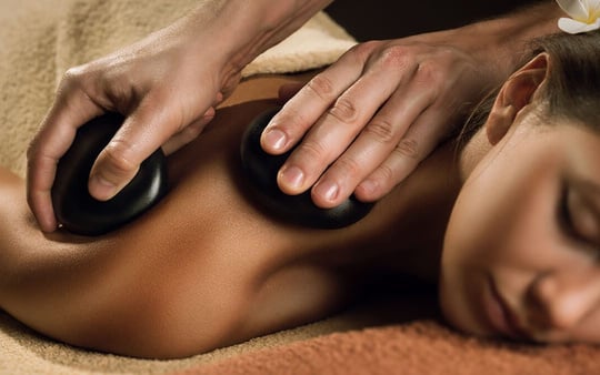 Young Woman Receiving a Body Massage